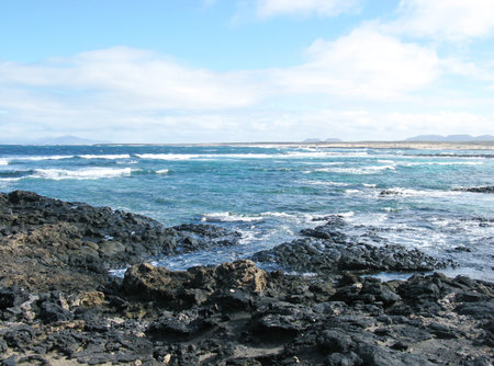 The rocks and the wave breakers of the Atlantic ocean at  Punto de la Ballena on the island...