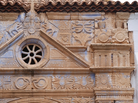 The church of Nuestra Senora de Regla in Pajara town has interesting sculptures of sun pattern snakes panther and birds above the main entranceの写真素材