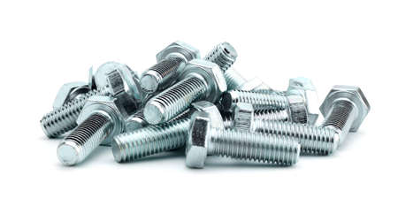 steel galvanized bolts with hex heads isolated on white backgroundの写真素材