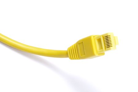 Yellow network cable isolated on whiteの写真素材