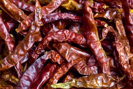 Closeup dried red chilli backgroundの写真素材