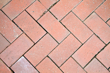 Texture of red bricks structure road background