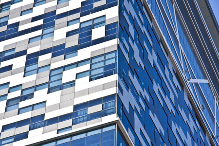 Texture of skyscraper windows background in Hong Kong 