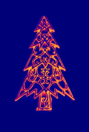 Christmas decorations isolated on blue background の写真素材