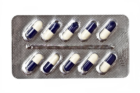 capsules packed in blister isolated on white 