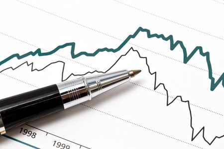 Background of business graph and a pen の写真素材
