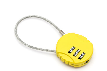 Yellow combination lock isolated on white background 