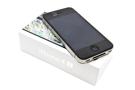 Apple iPhone 4s and box closeup on whiteのeditorial素材