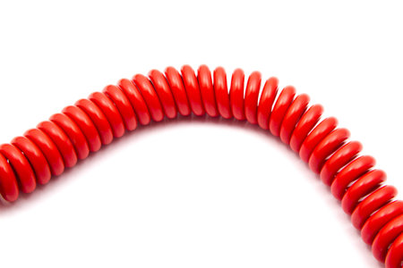 Red wire closeup on white background