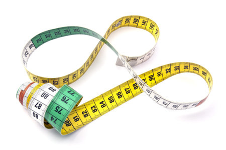 Tape measure closeup on white background 