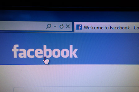 Facebook website displayed on a computer screen                     のeditorial素材