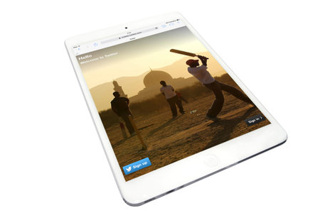Apple ipad and twitter website on white background