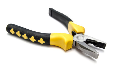 Pliers closeup on white background