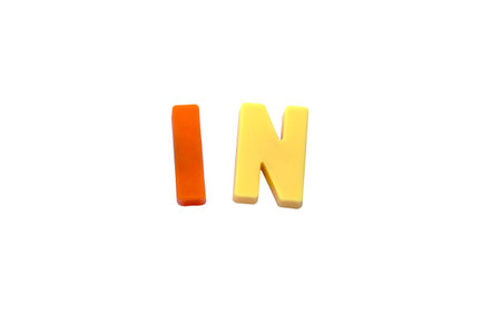 Letter magnets  IN  isolated on whiteの写真素材