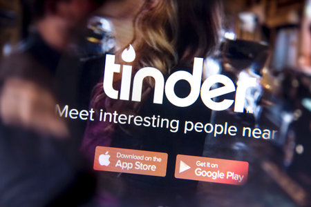 Close up of tinder website on a computer screen. Tinder is a location-based dating and social...