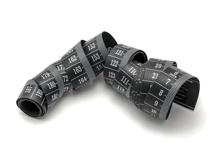 Tape measure on whiteの写真素材