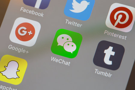 Popular social network icons on a Apple iPhone 7 screen device.のeditorial素材