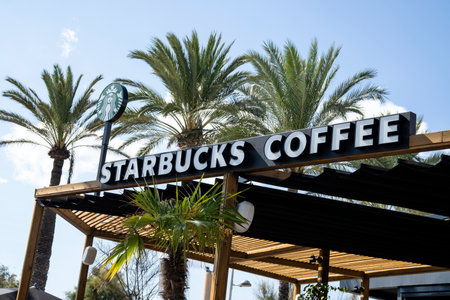 Palma de Mallorca, Spain - September 19, 2017. Starbucks coffee sign. Starbucks Coffee is an American chain of coffee shops, founded in Seattle.のeditorial素材