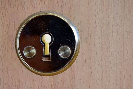 Watch through (peeping through, peeking through) keyholesの写真素材