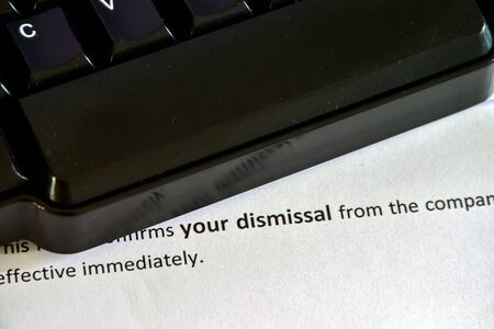 Receiving a Dismissal Letter on the desktopの写真素材
