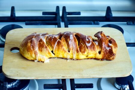 Homemade apple pie on a cutting wooden board. Homemade baking.の写真素材