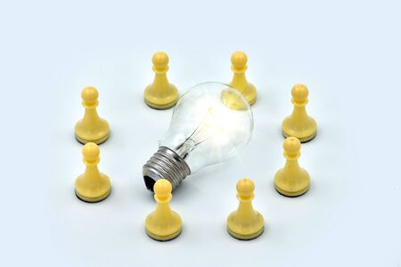 The concept is the generation of ideas, brainstorming, teamwork. The light is on, an idea is found, the problem is solved.の写真素材