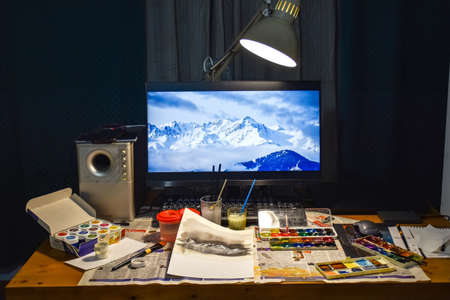 Evening art, painting a beautiful mountain landscape with watercolorの写真素材