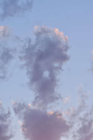 Overcast clouds against the evening skyの写真素材