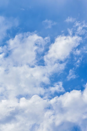 Fluffy and light clouds on the blue sky