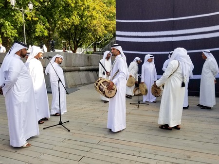 Moscow, Russia - July 2018: Group of qatari people presenting traditional music during Qatar FIFA 2022 visiting card in Gorky Park.のeditorial素材
