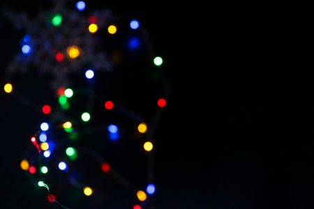 Many blurred bright bubble lights bokeh colorful drops. New year and christmas luxury welcome card...