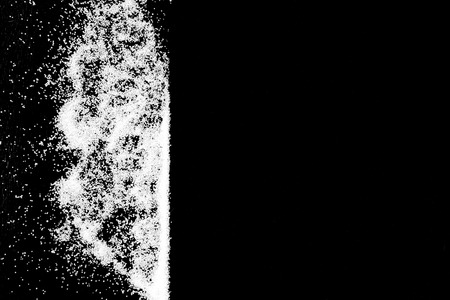 White snow salt powder left side line cloud on black background. Concept with place for text. Copy space.の写真素材