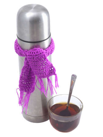 Thermos on a white background with a scarfの写真素材