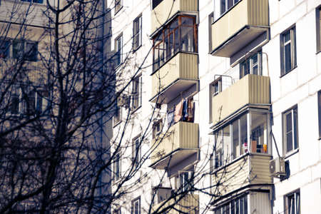 The facade of a residential building in Moscow illuminated by sunlight. The concept of a residential building.の写真素材