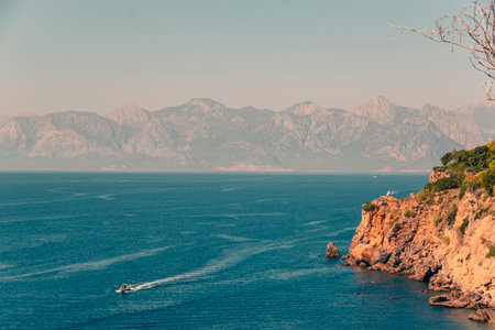 The sea distance against the background of mountains on the horizon. The beauty of the environment.の写真素材