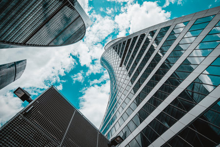 Towers of the business center "Moscow City" Empire and Evolution on the background of the sky with clouds. close-up shooting. Moscow. 05/09/2023.の写真素材