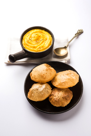 Amrakhand OR Mango Shrikhand with puri or Pooriの写真素材