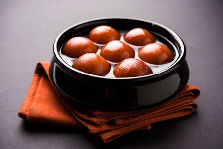Sweet Gulab Jamun in terracotta bowlの写真素材