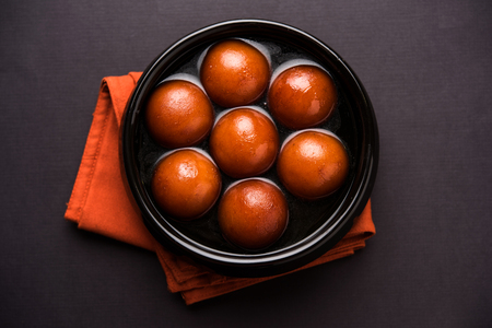 Sweet Gulab Jamun in terracotta bowlの写真素材