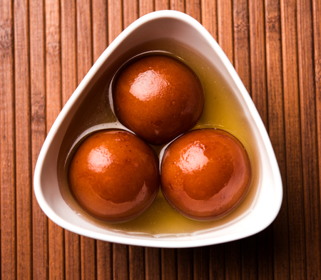Sweet Gulab Jamun in terracotta bowlの写真素材