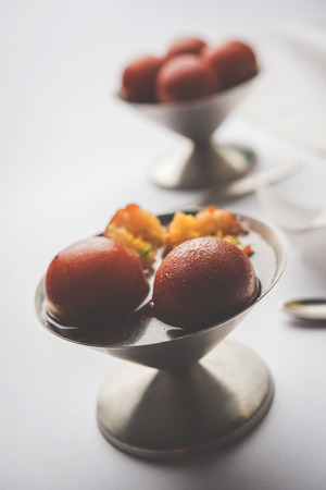 Sweet Gulab Jamun in terracotta bowlの写真素材