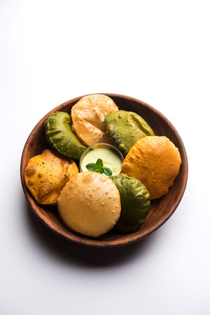 fried Plain Puri , spinach and masala poori served with green chutney, selective focusの写真素材
