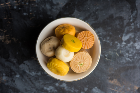 Indian Chilli Chicken dry, served in a plate over moody background. Selective focusの写真素材
