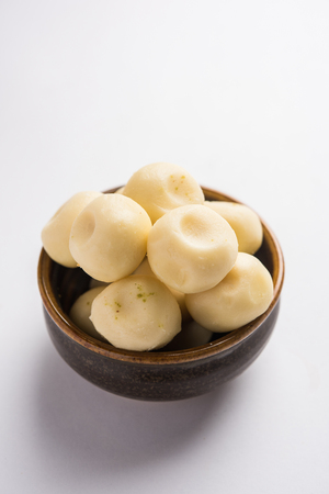Indian Chilli Chicken dry, served in a plate over moody background. Selective focusの写真素材