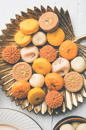 Indian Chilli Chicken dry, served in a plate over moody background. Selective focusの写真素材