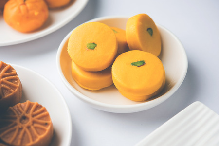 Raksha bandhan Festival greetings: conceptual Rakhi made using a plate full of Kaju Katli Barfi/Burfi and fancy band and pooja Thali. selective focusの写真素材