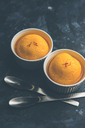 Hara bhara Kabab or Kebab is Indian vegetarian snack recipe served with green mint chutney over moody background. selective focusの写真素材