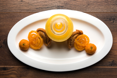Carrot Pickle / Gajar ka Achar or Loncha in hindi. Served in a bowl over moody background. Selective focusの写真素材