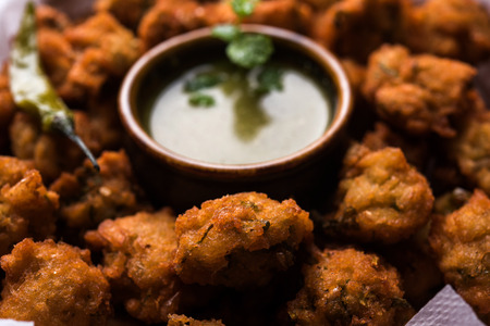 Raksha bandhan Festival : conceptual Rakhi made using plate full of Bundi Laddu sweet with band and Pooja Thali. A traditional Indian wrist band which is a symbol of love between Brothers and Sistersの写真素材