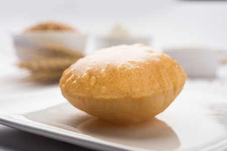 Homemade Fried Puri or Poori Or Indian Bread, selective focus